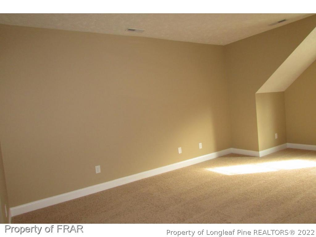 3341 Thrower Road Hope Mills, NC 28348 - Photo 21 of 32 a view of an empty room and window