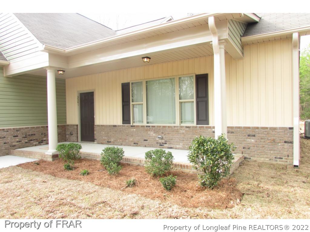 3341 Thrower Road Hope Mills, NC 28348 - Photo 22 of 32 a front view of a house