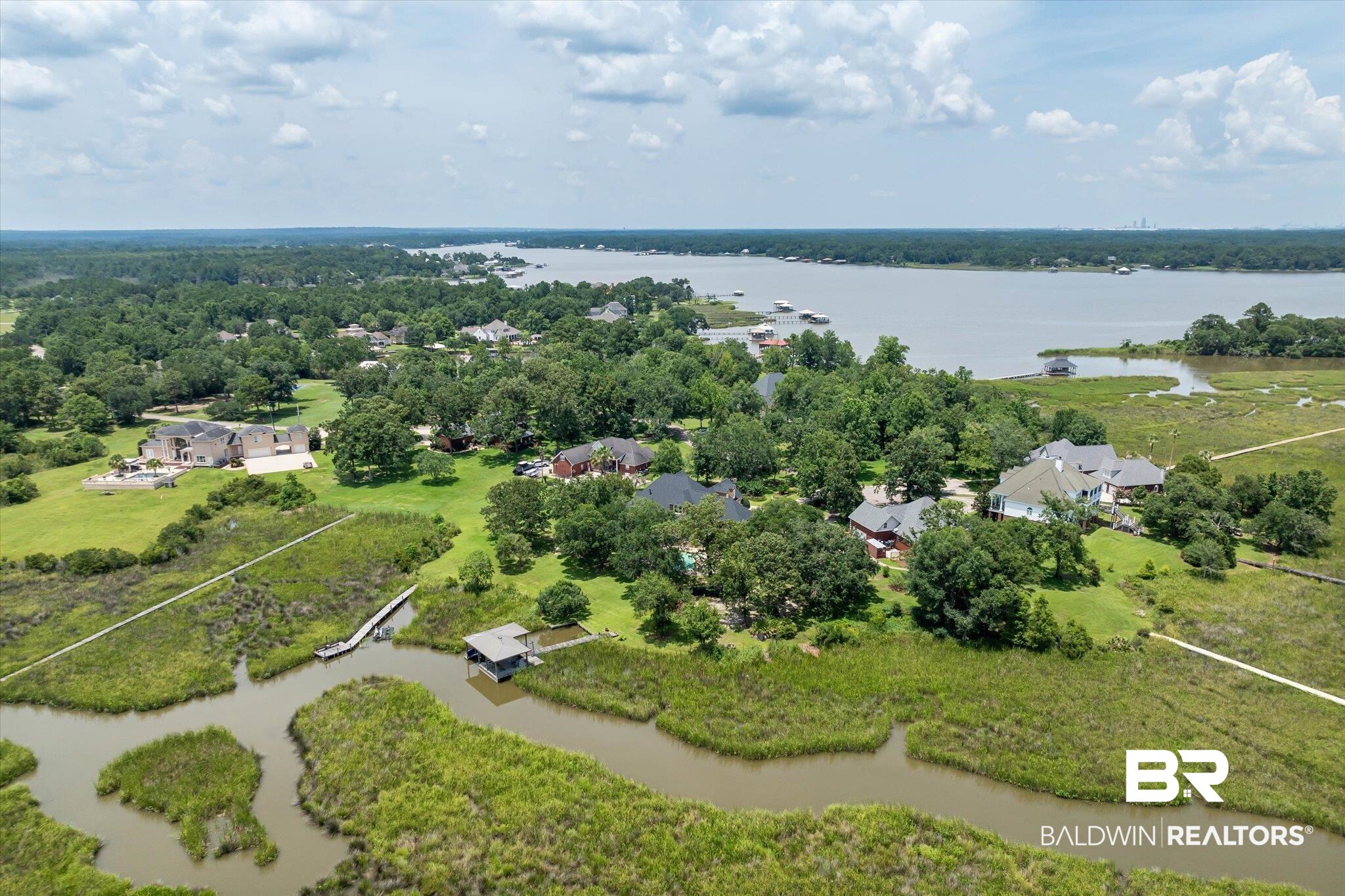 2905 Riverview Pointe Drive South Theodore, AL 36582 - Photo 39 of 44 Aerial view of property and surrounding area featuring a large body of water and property parcel outlined
