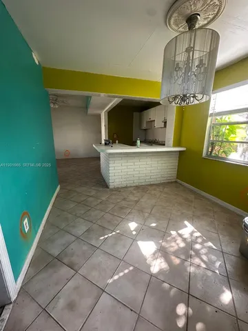 a room with a chandelier