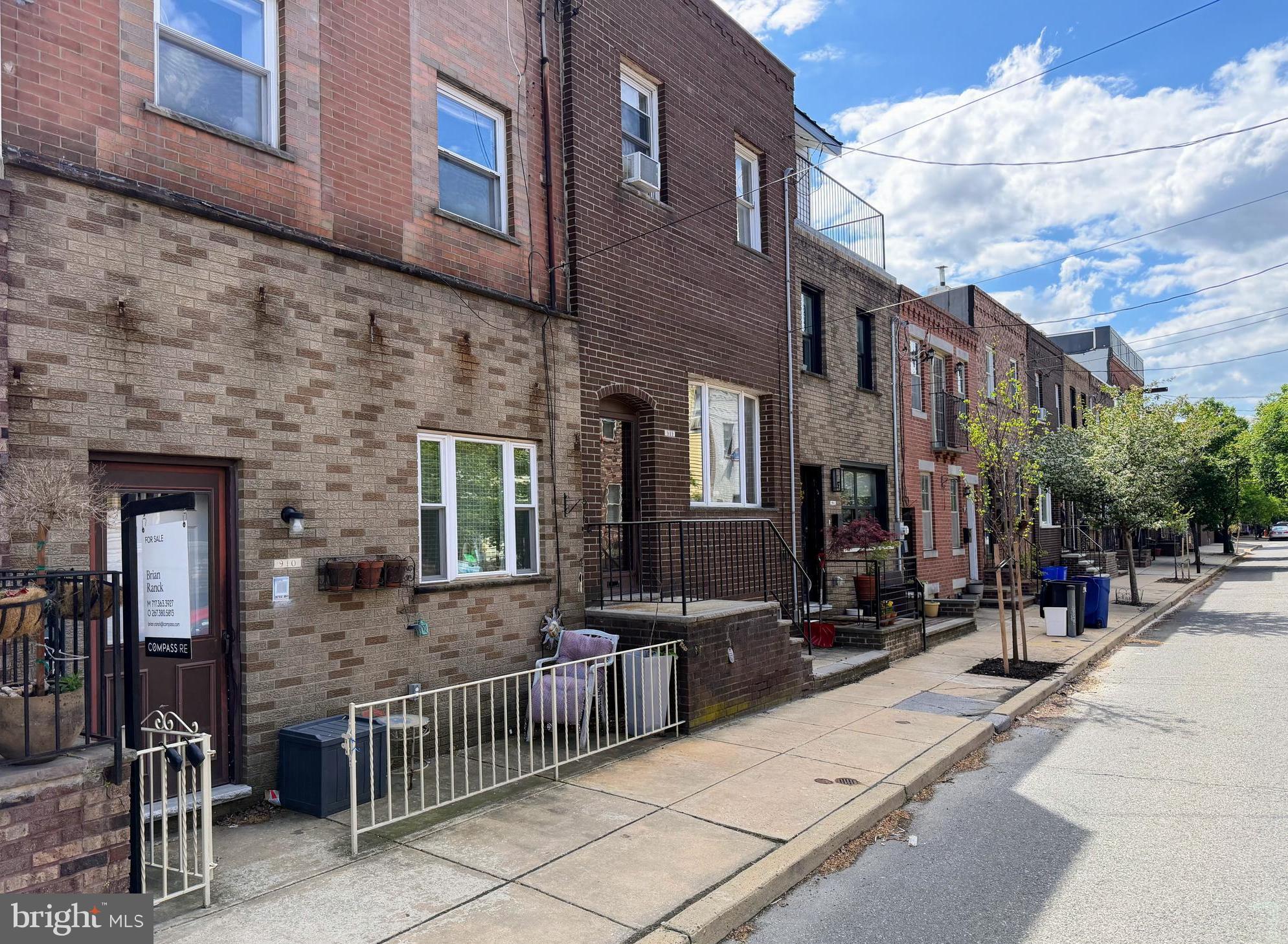 910 Mountain Street Philadelphia, PA 19148 - Photo 1 of 31 a view of a building with many windows