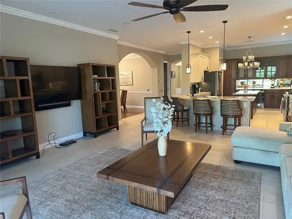 a living room with furniture and a rug