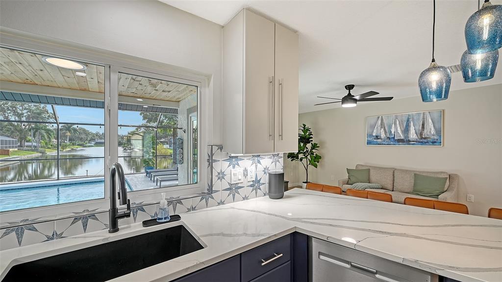 3924 Helene Street Sarasota, FL 34233 - Photo 23 of 53 a kitchen with a sink and large window