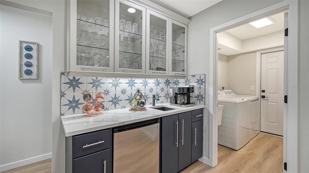 3924 Helene Street Sarasota, FL 34233 - Photo 26 of 53 a bathroom with a sink and a mirror