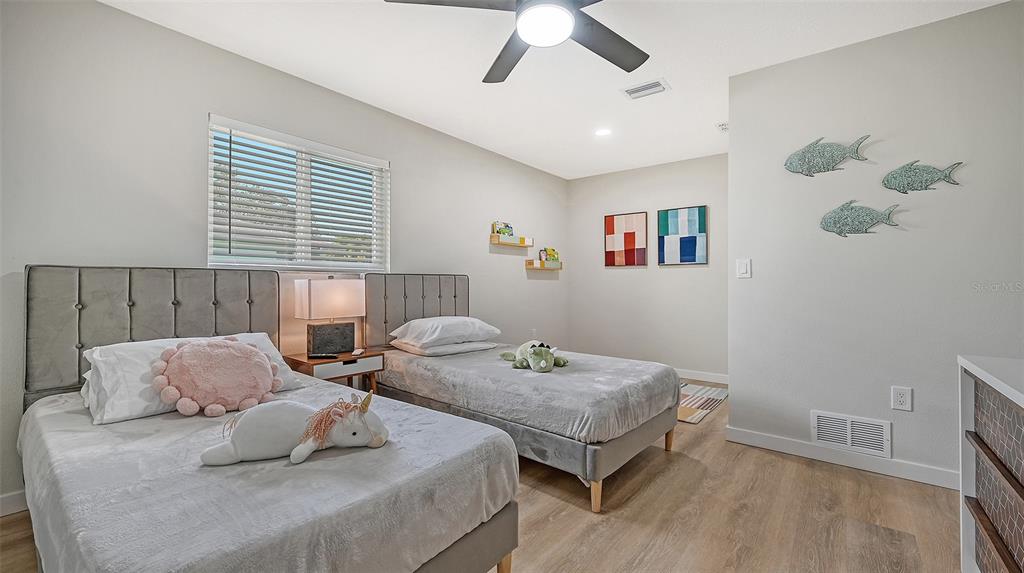 3924 Helene Street Sarasota, FL 34233 - Photo 38 of 53 a living room with furniture and a window