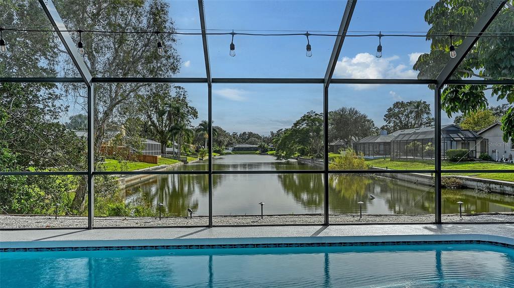 3924 Helene Street Sarasota, FL 34233 - Photo 44 of 53 a view of a lake from a balcony