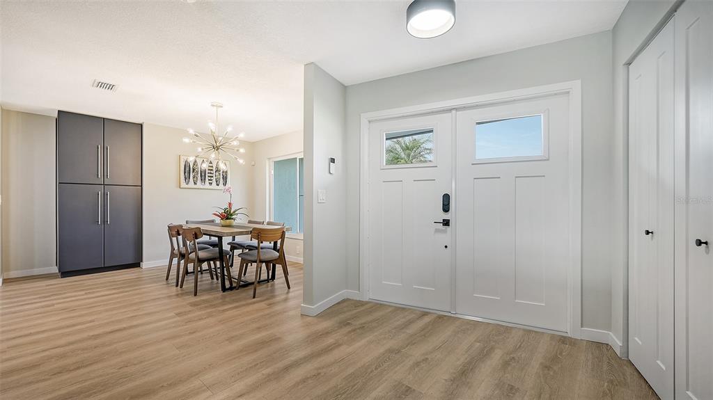 3924 Helene Street Sarasota, FL 34233 - Photo 5 of 53 a view of a livingroom with furniture and wooden floor