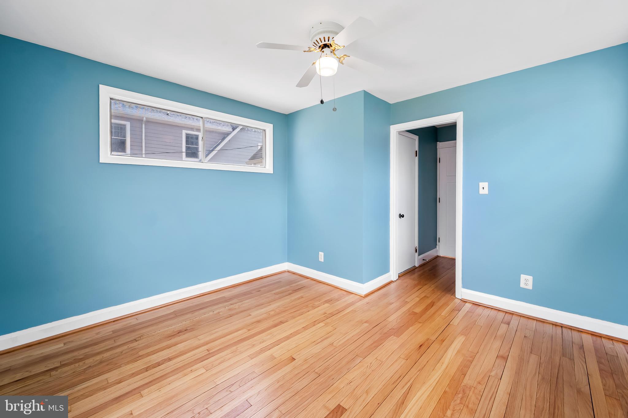 630 Dunkirk Road Baltimore, MD 21212 - Photo 13 of 36 a view of empty room with wooden floor