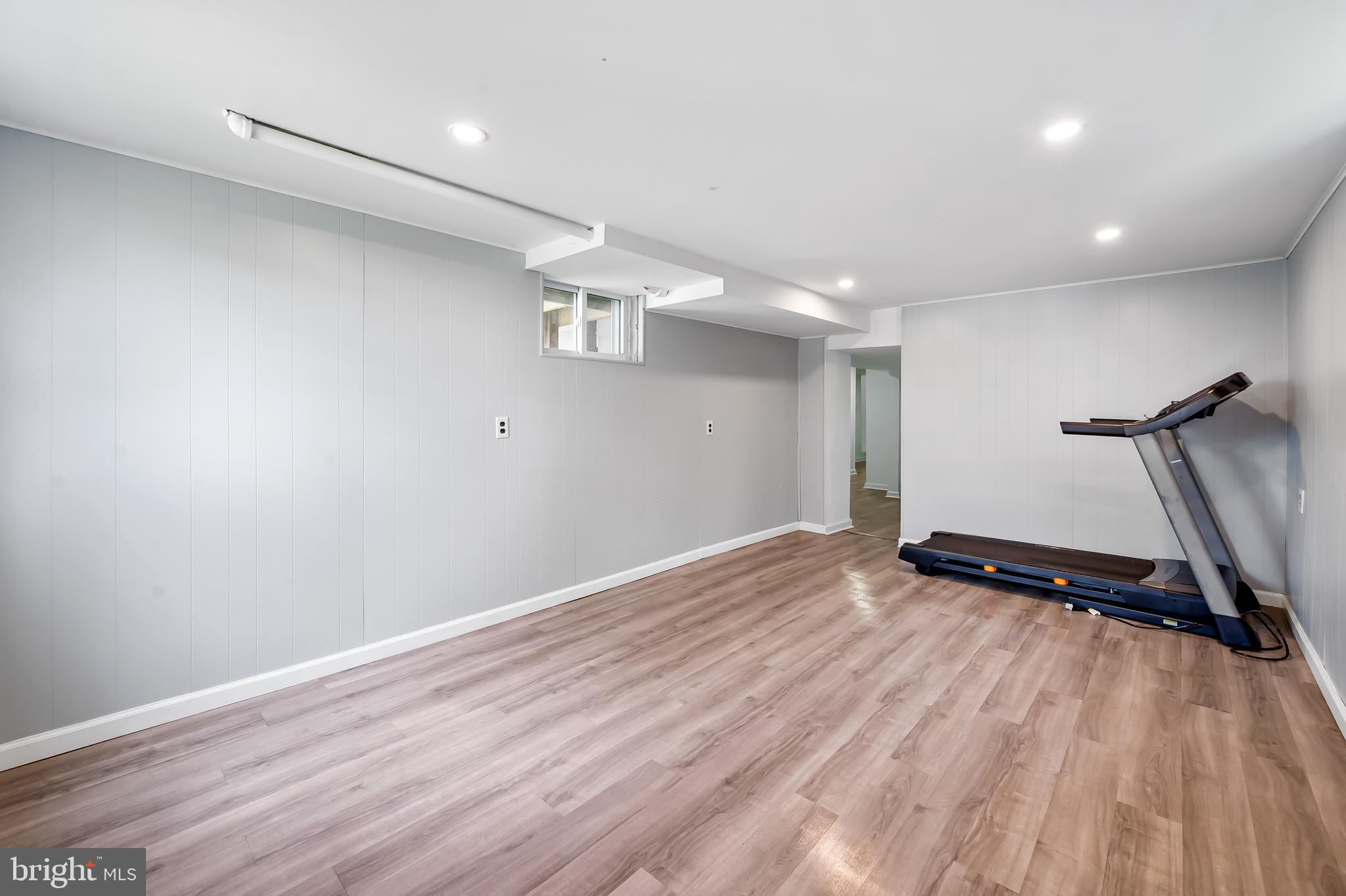 630 Dunkirk Road Baltimore, MD 21212 - Photo 30 of 36 a view of a room with wooden floor and window