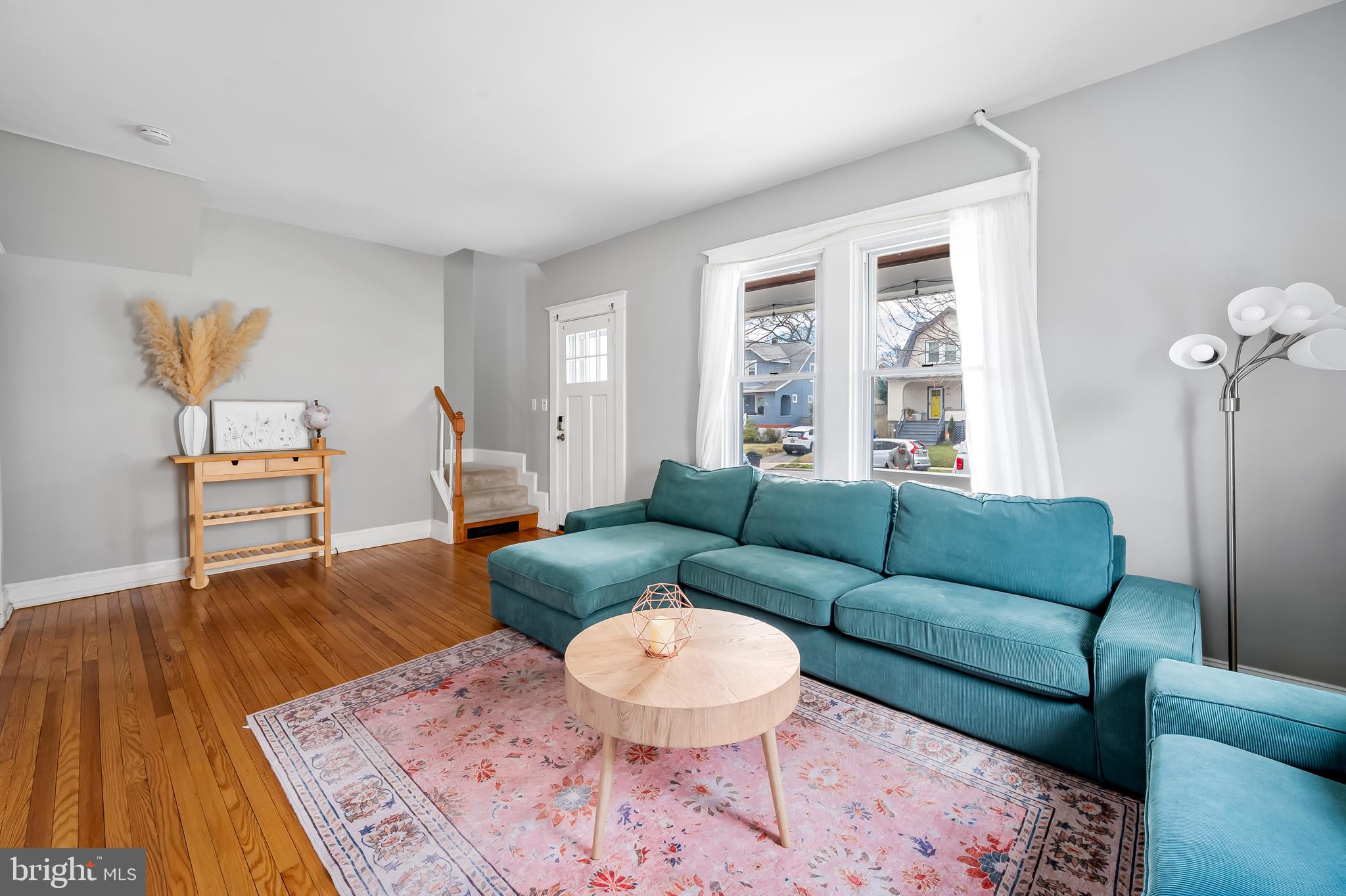 630 Dunkirk Road Baltimore, MD 21212 - Photo 4 of 36 a living room with furniture and a wooden floor