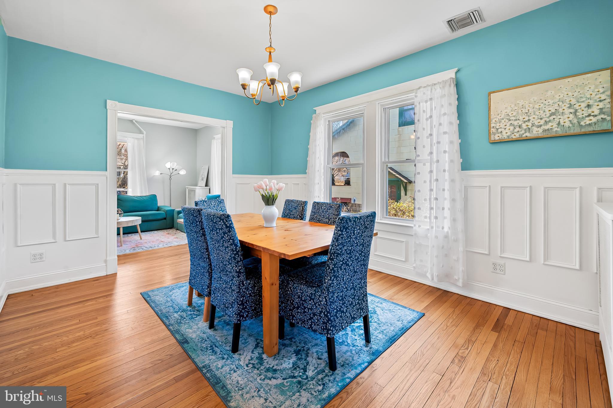 630 Dunkirk Road Baltimore, MD 21212 - Photo 6 of 36 a view of a dining room with furniture and wooden floor