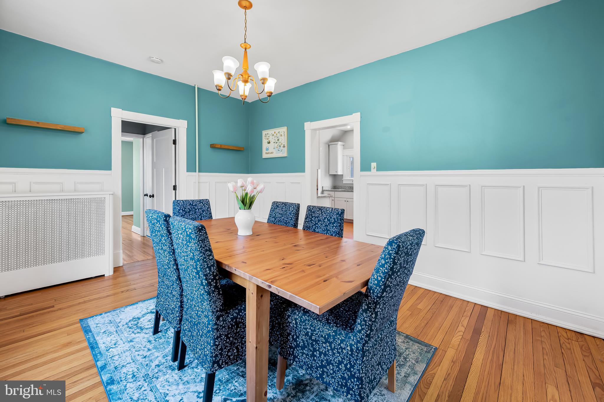 630 Dunkirk Road Baltimore, MD 21212 - Photo 7 of 36 a view of a dining room with furniture and wooden floor