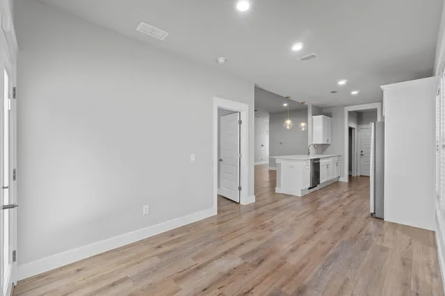 a view of an empty walk in closet