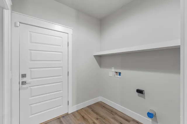 a view of cabinets and wooden floor