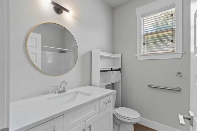 a bathroom with a shower and a bath tub