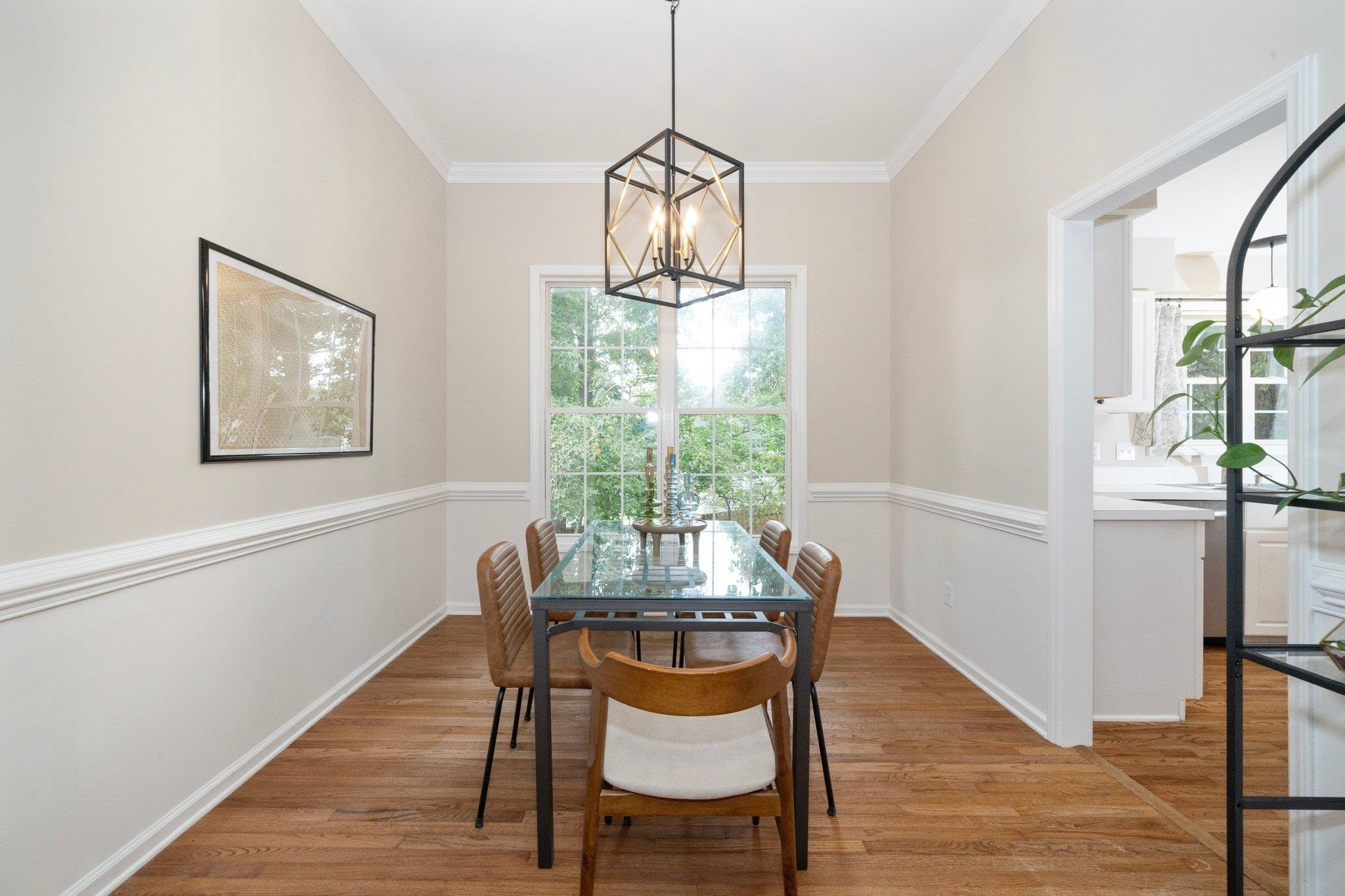8813 Harps Mill Road Raleigh, NC 27615 - Photo 13 of 28 a dining room with furniture window wooden floor