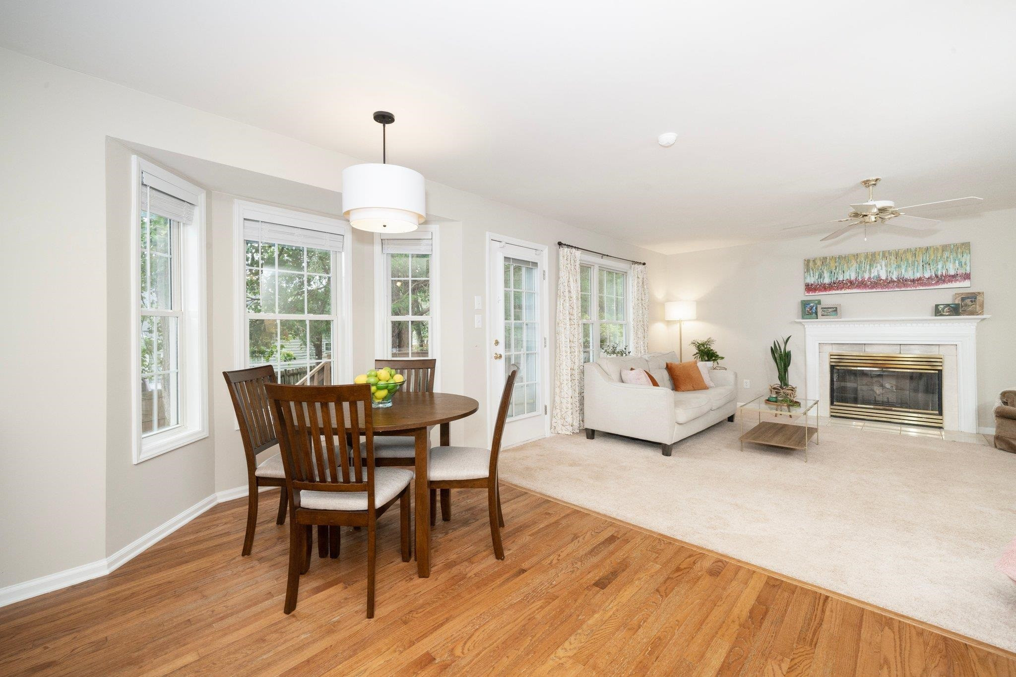 8813 Harps Mill Road Raleigh, NC 27615 - Photo 14 of 28 a view of a livingroom with furniture window and wooden floor
