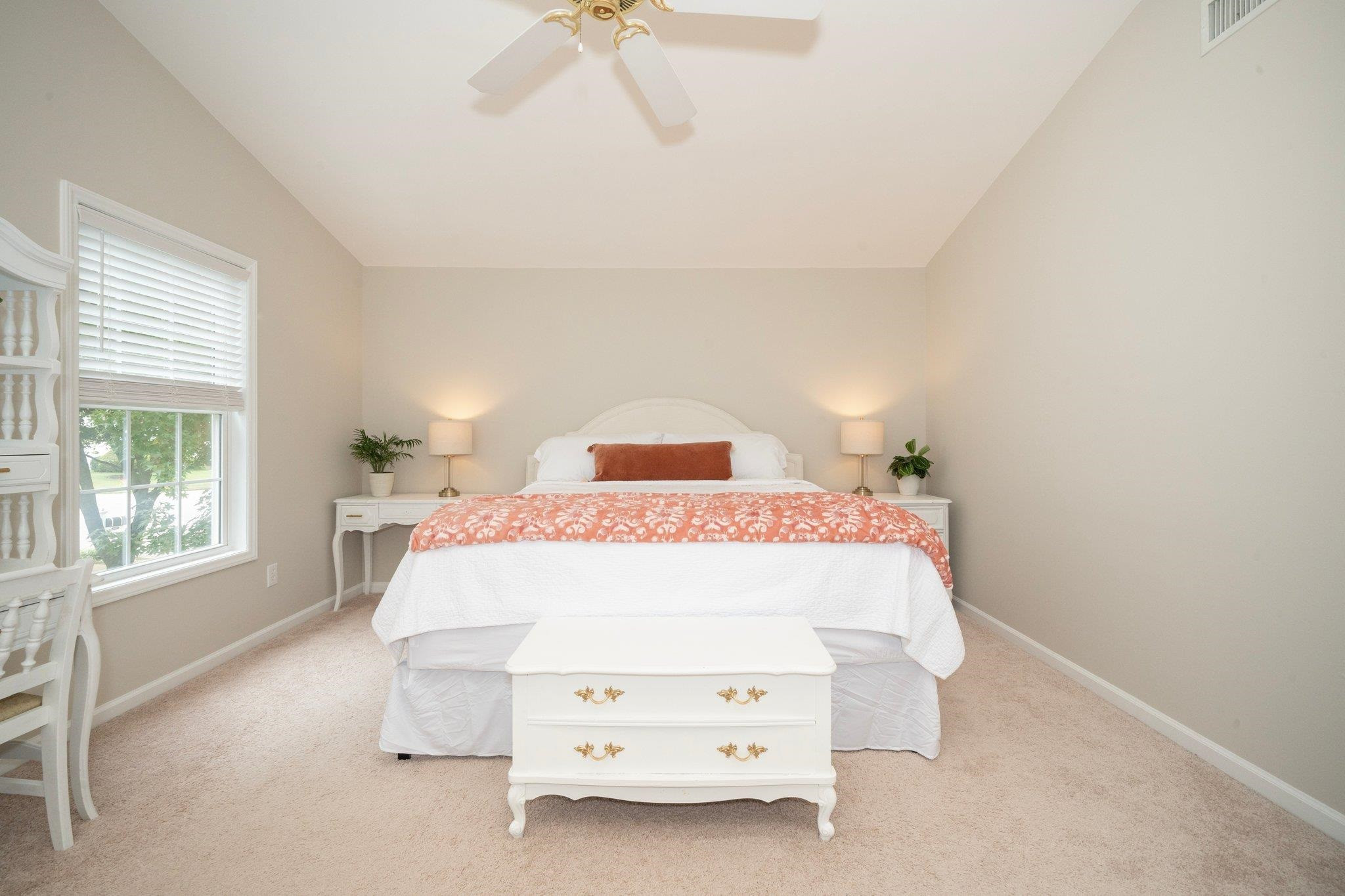 8813 Harps Mill Road Raleigh, NC 27615 - Photo 16 of 28 a bedroom with a bed and window