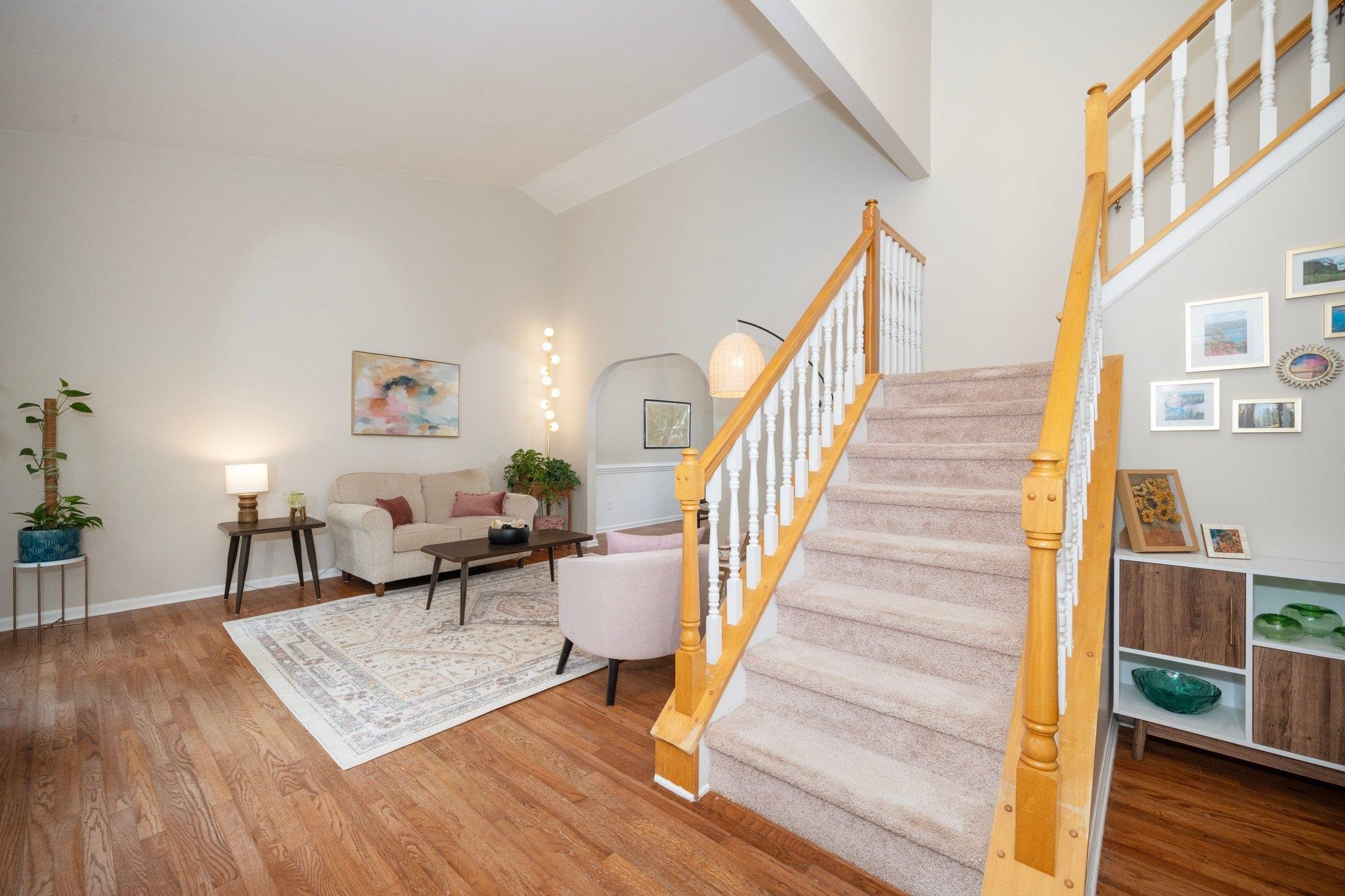 8813 Harps Mill Road Raleigh, NC 27615 - Photo 6 of 28 a living room with furniture and a wooden floor