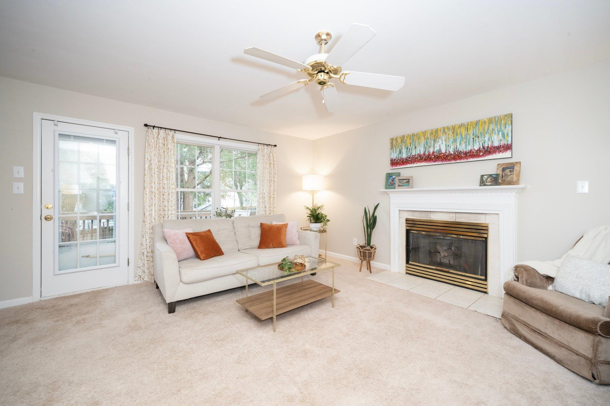 8813 Harps Mill Road Raleigh, NC 27615 - Photo 9 of 28 a living room with furniture and a fireplace