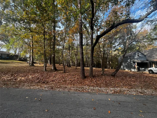 a fire hydrant in middle of a field