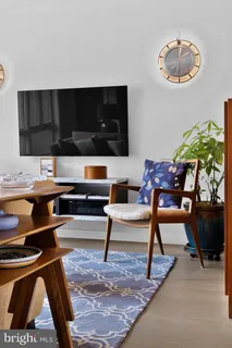 a bathroom with a sink a toilet and bathtub
