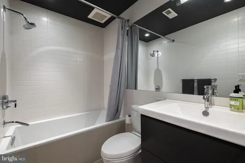 a view of balcony with furniture and wooden deck