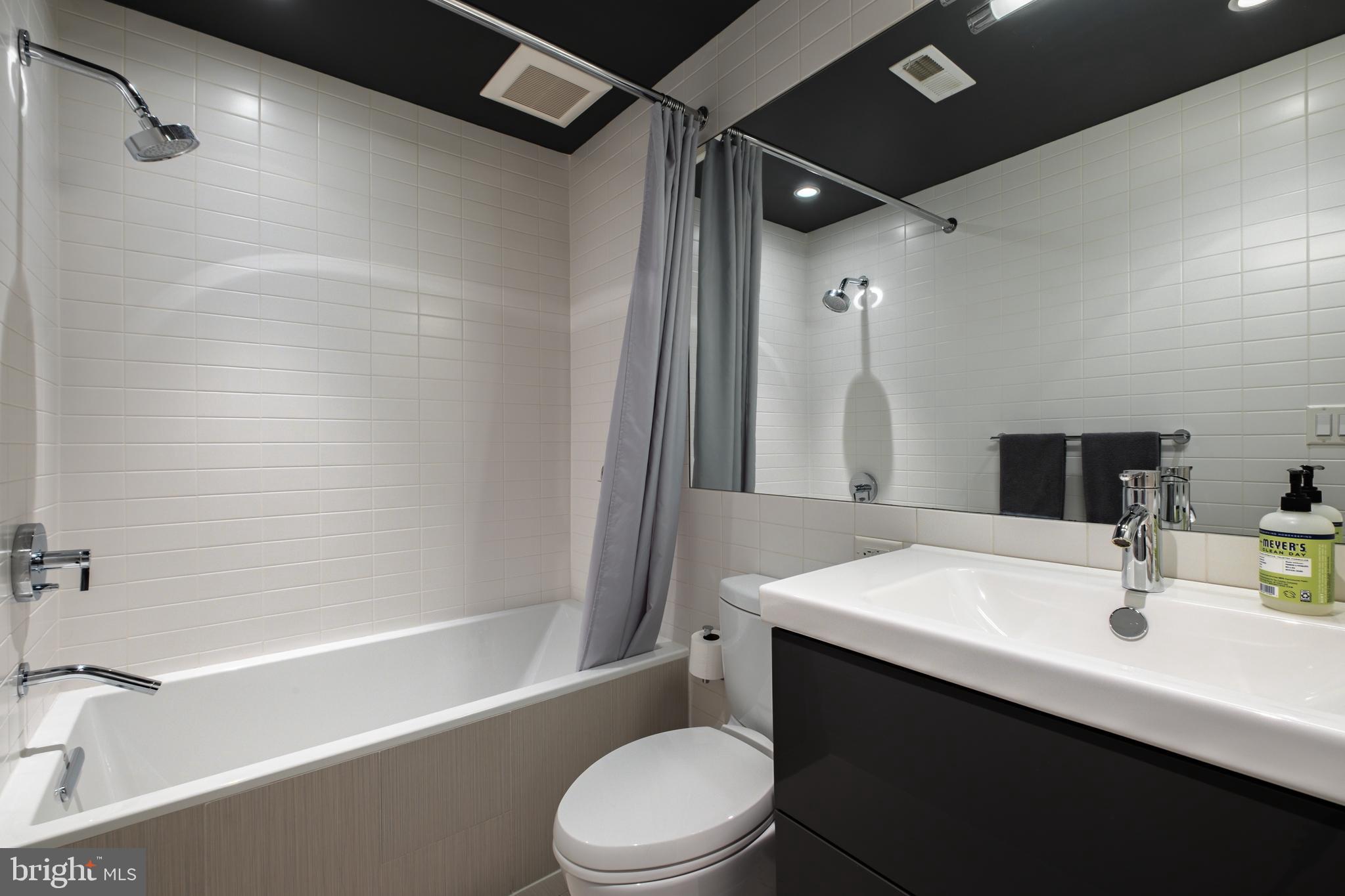 256 South 3rd Street Philadelphia, PA 19106 - Photo 31 of 72 a bathroom with a sink a toilet and shower