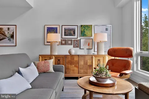 a room with furniture and a window