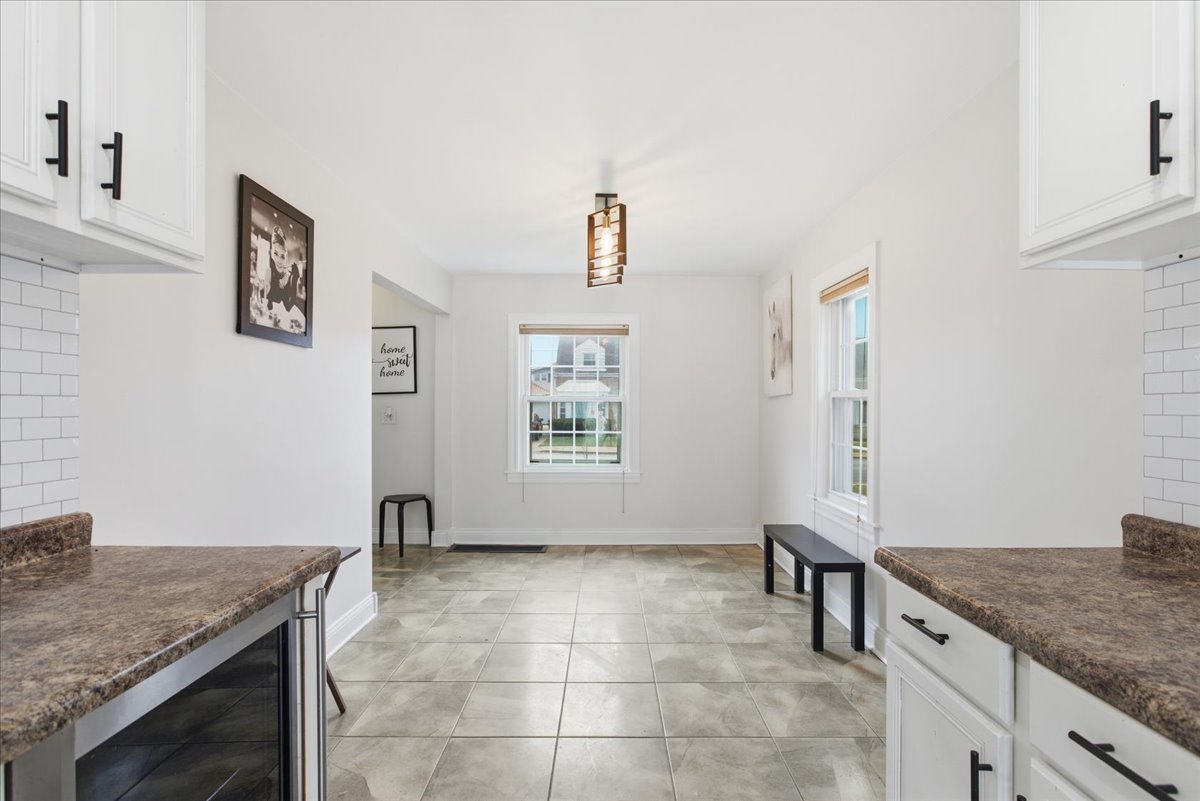7802 West Victoria Street Chicago, IL 60631 - Photo 5 of 10 a view of kitchen with granite countertop window and sink