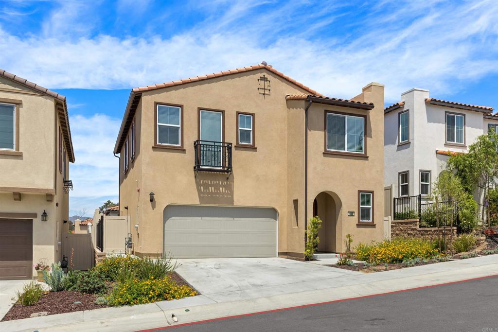 895 Brookdale Drive Vista, CA 92081 - Photo 2 of 45 a front view of a house with garden