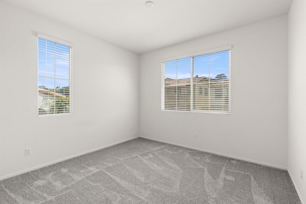 895 Brookdale Drive Vista, CA 92081 - Photo 25 of 45 a view of an empty room with a window
