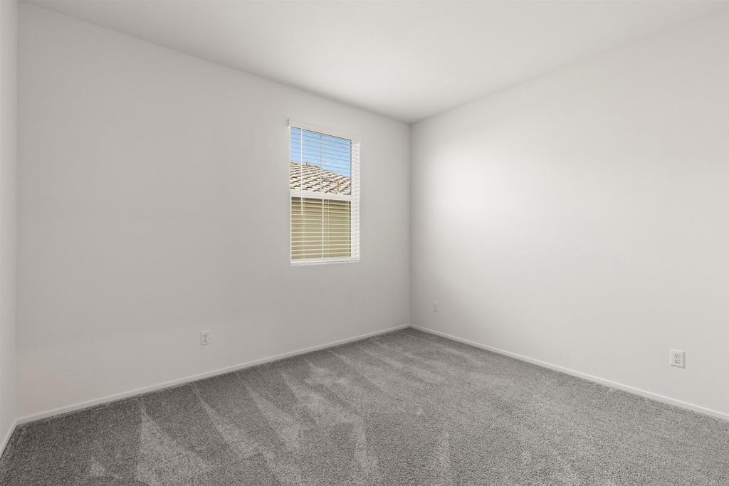 895 Brookdale Drive Vista, CA 92081 - Photo 28 of 45 an empty room with a window