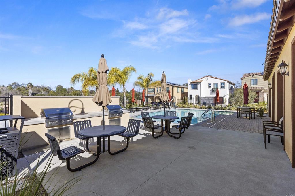 895 Brookdale Drive Vista, CA 92081 - Photo 34 of 45 a view of a terrace with seating area