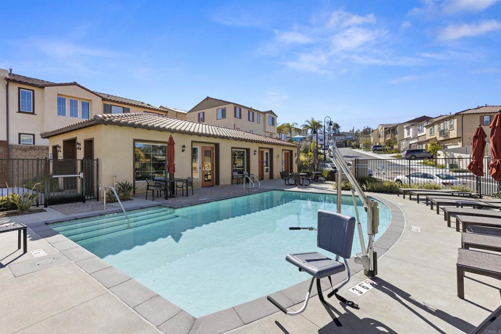 895 Brookdale Drive Vista, CA 92081 - Photo 43 of 45 a view of a patio with table and chairs with wooden floor and fence