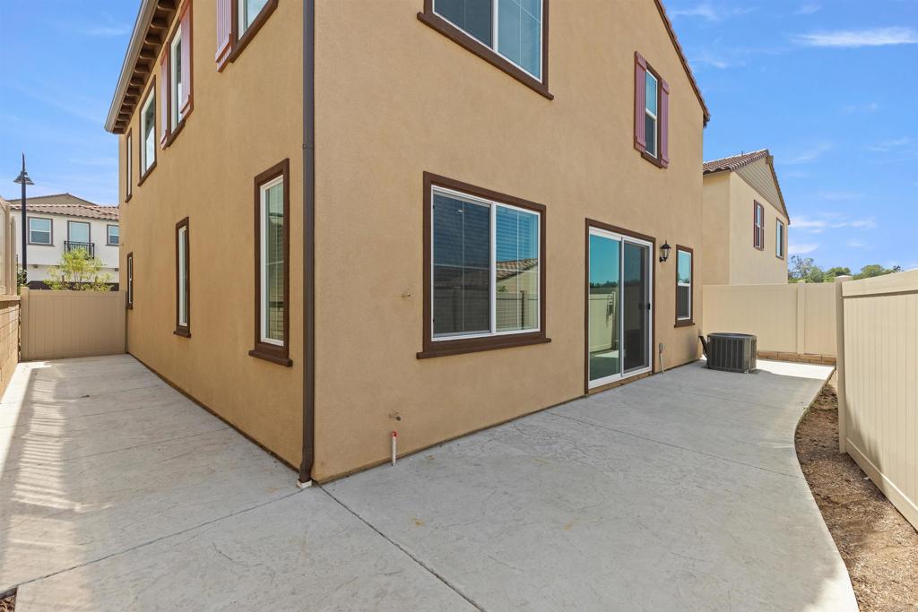 895 Brookdale Drive Vista, CA 92081 - Photo 7 of 45 a view of a house with a backyard