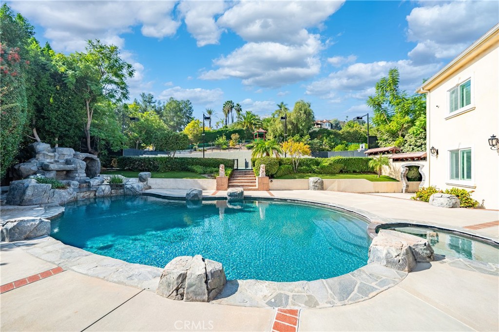 19910 Tennessee Trail Walnut, CA 91789 - Photo 14 of 70 a view of a swimming pool with a outdoor seating