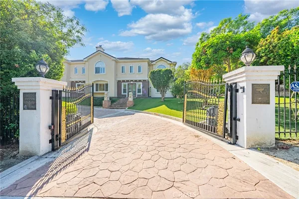 a view of a house with a garden