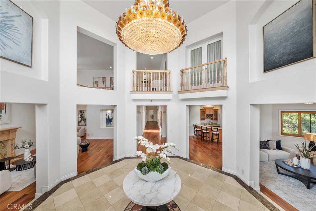 19910 Tennessee Trail Walnut, CA 91789 - Photo 21 of 70 a living room with furniture and a chandelier