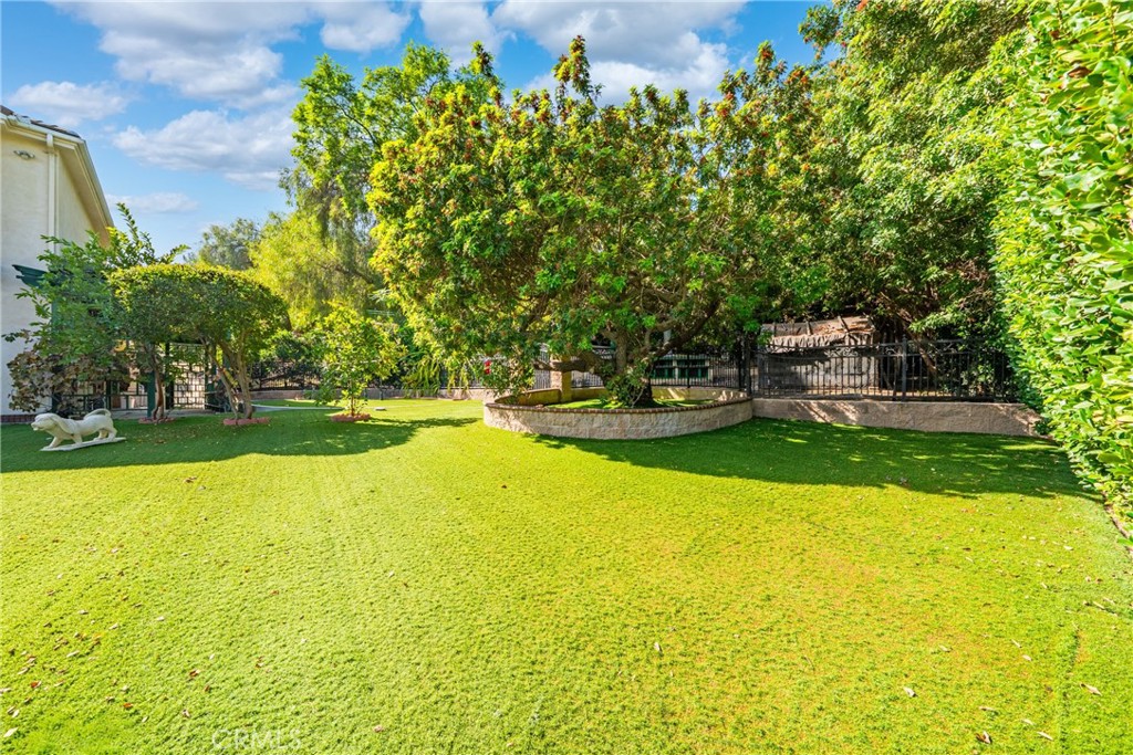 19910 Tennessee Trail Walnut, CA 91789 - Photo 66 of 70 a view of a swimming pool with an outdoor space and seating area