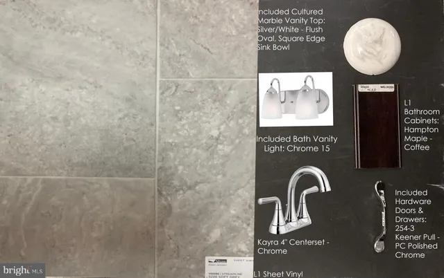 a picture of a bathroom with sink and a mirror