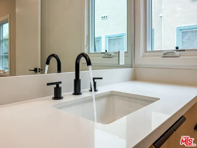 a bathroom with a shower and a toilet