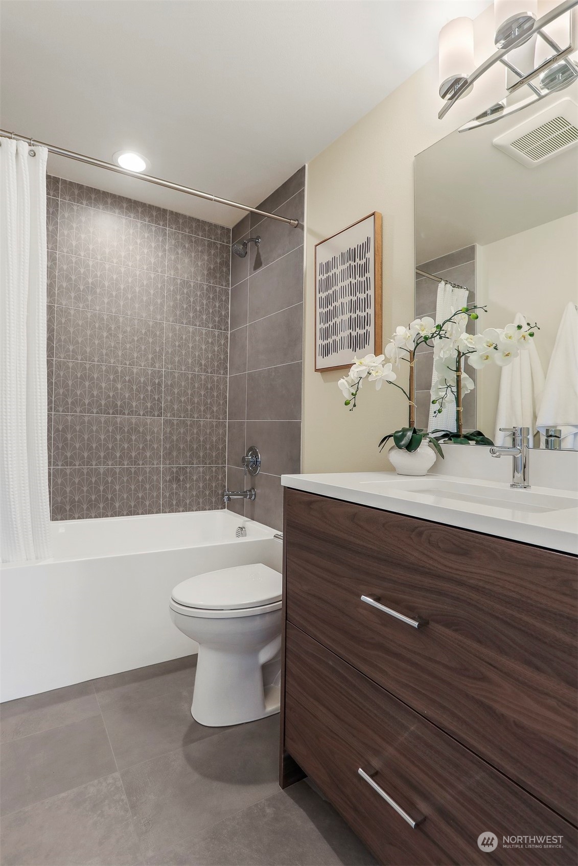 520 North 48th Street, Unit B Seattle, WA 98103 - Photo 20 of 38 a bathroom with a sink a toilet and shower