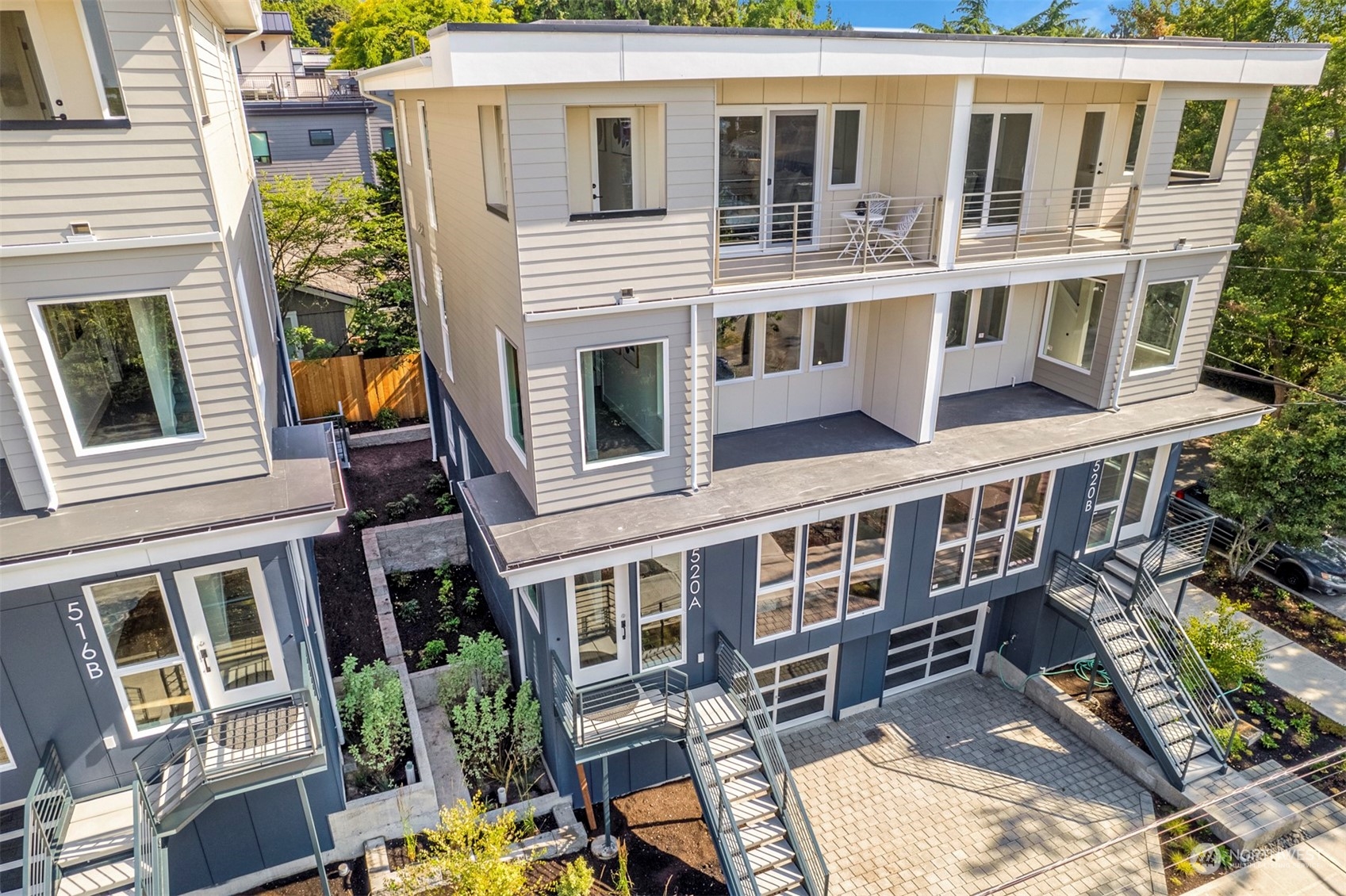 520 North 48th Street, Unit B Seattle, WA 98103 - Photo 2 of 38 a balcony with furniture and garden view