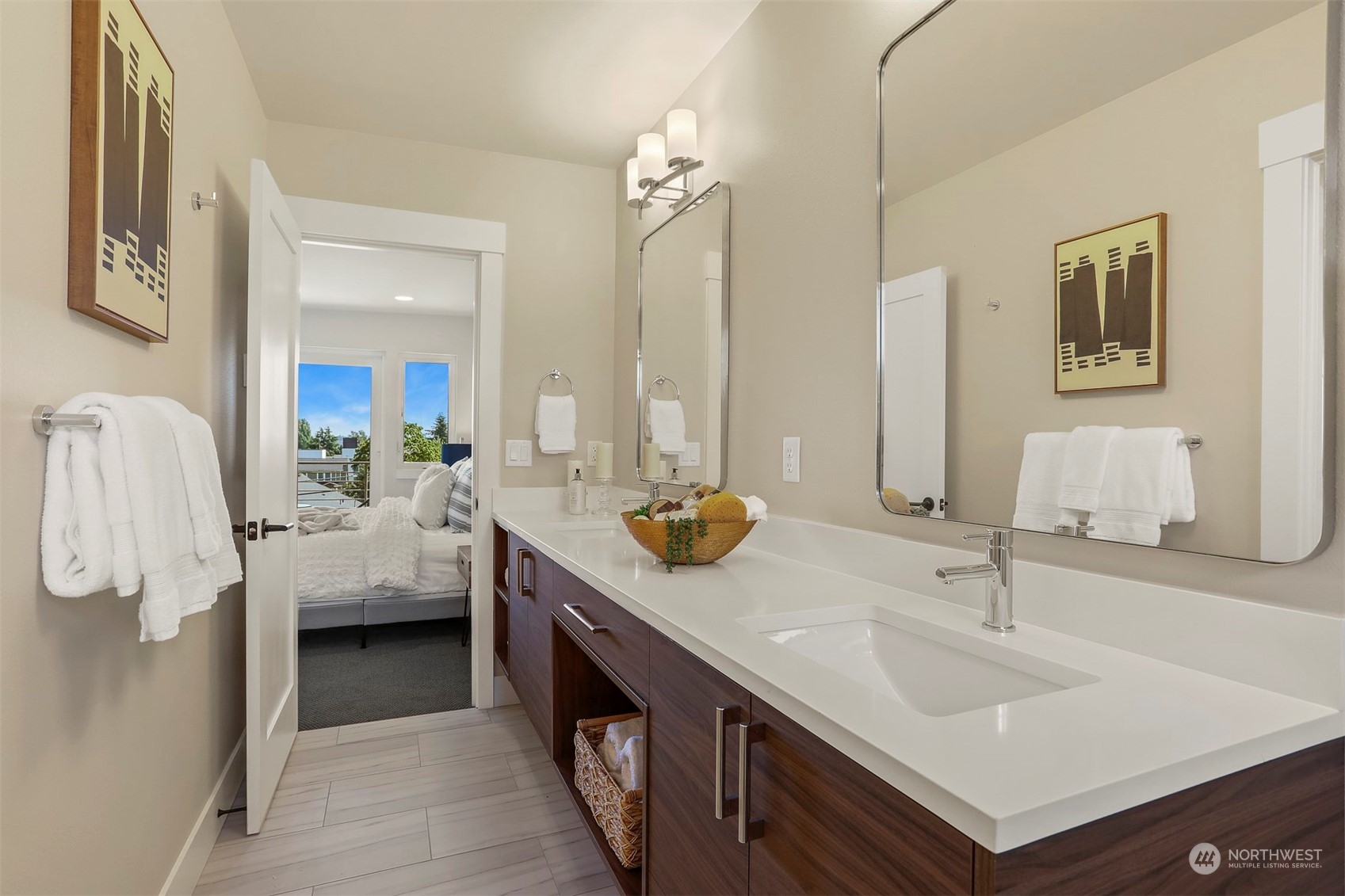 520 North 48th Street, Unit B Seattle, WA 98103 - Photo 29 of 38 a bathroom with a sink double vanity and a mirror