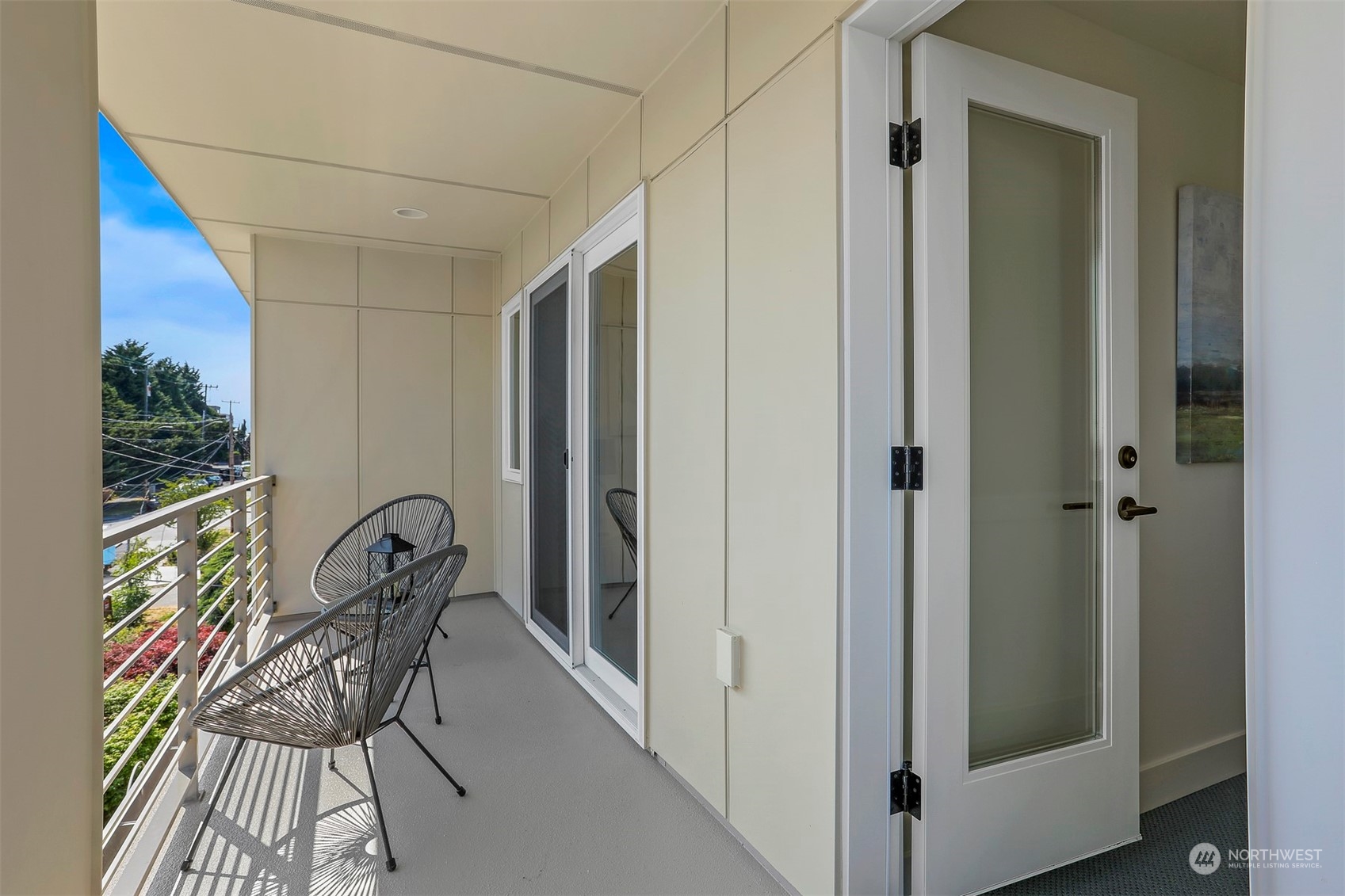 520 North 48th Street, Unit B Seattle, WA 98103 - Photo 31 of 38 a view of a hallway with chairs and furniture