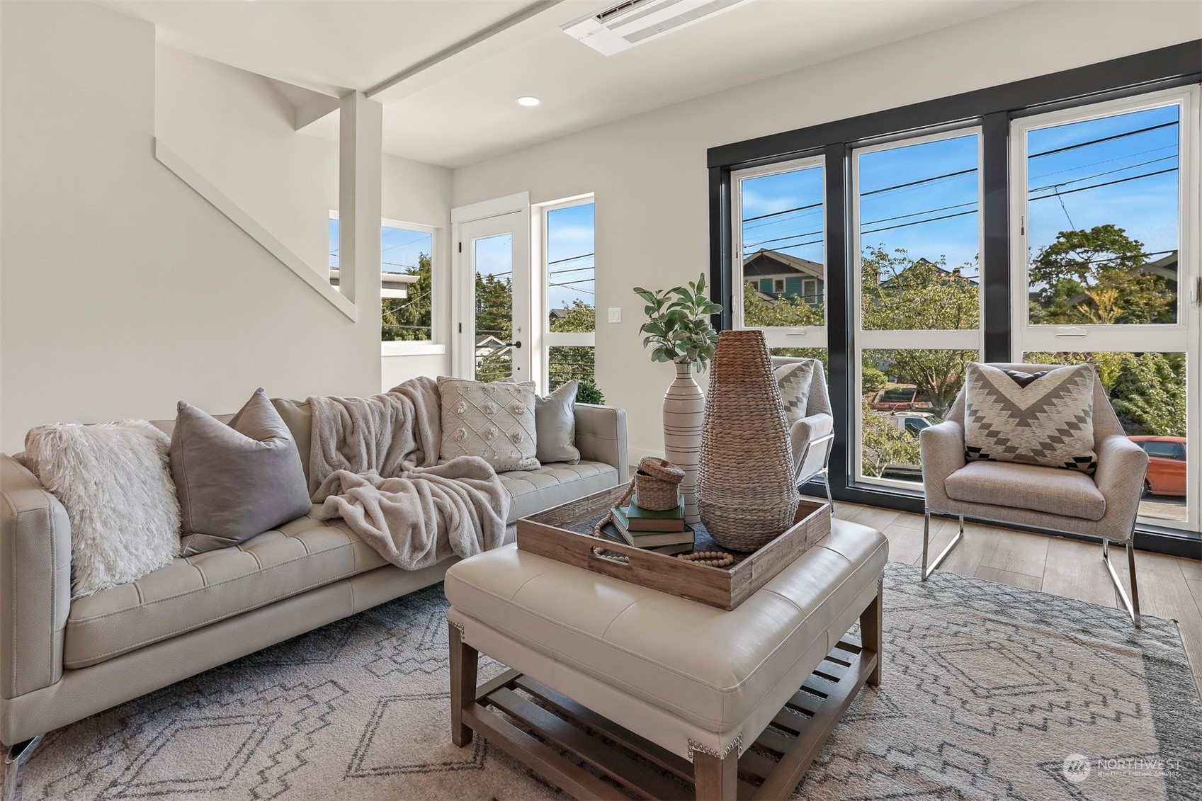 520 North 48th Street, Unit B Seattle, WA 98103 - Photo 5 of 38 a living room with furniture and large windows
