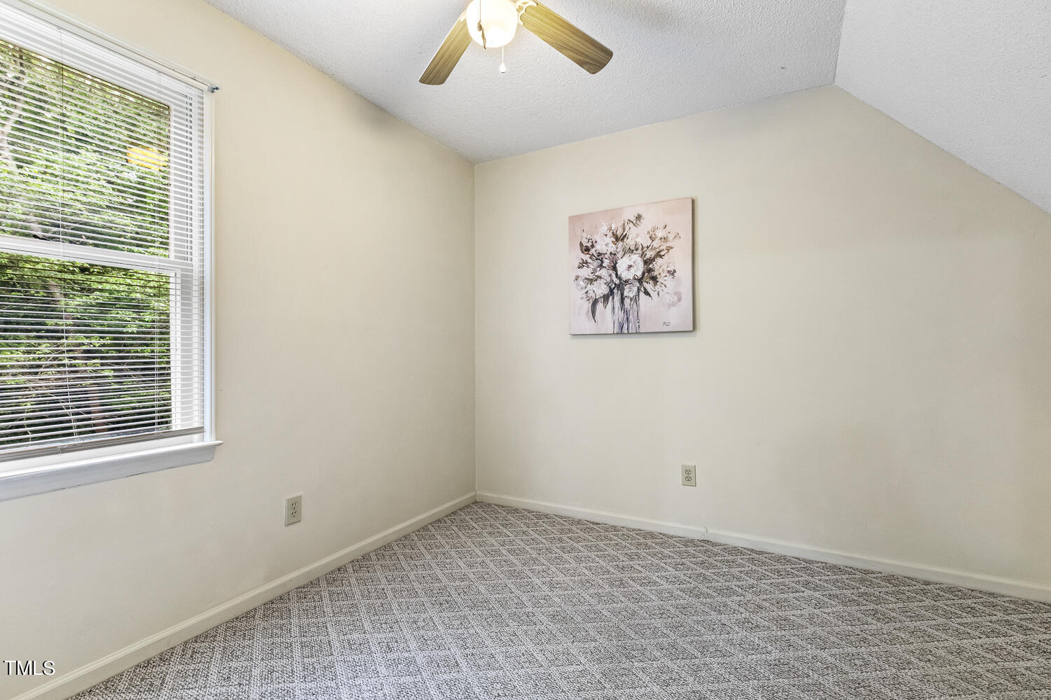 4700 Knightsbridge Way Raleigh, NC 27604 - Photo 8 of 11 an empty room with a window