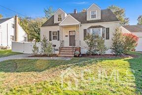 39 Morningside Road Colonia, NJ 07067 - Photo 1 of 30 a front view of a house with garden