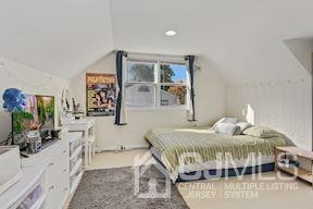 39 Morningside Road Colonia, NJ 07067 - Photo 13 of 30 a bedroom with furniture and a flat screen tv